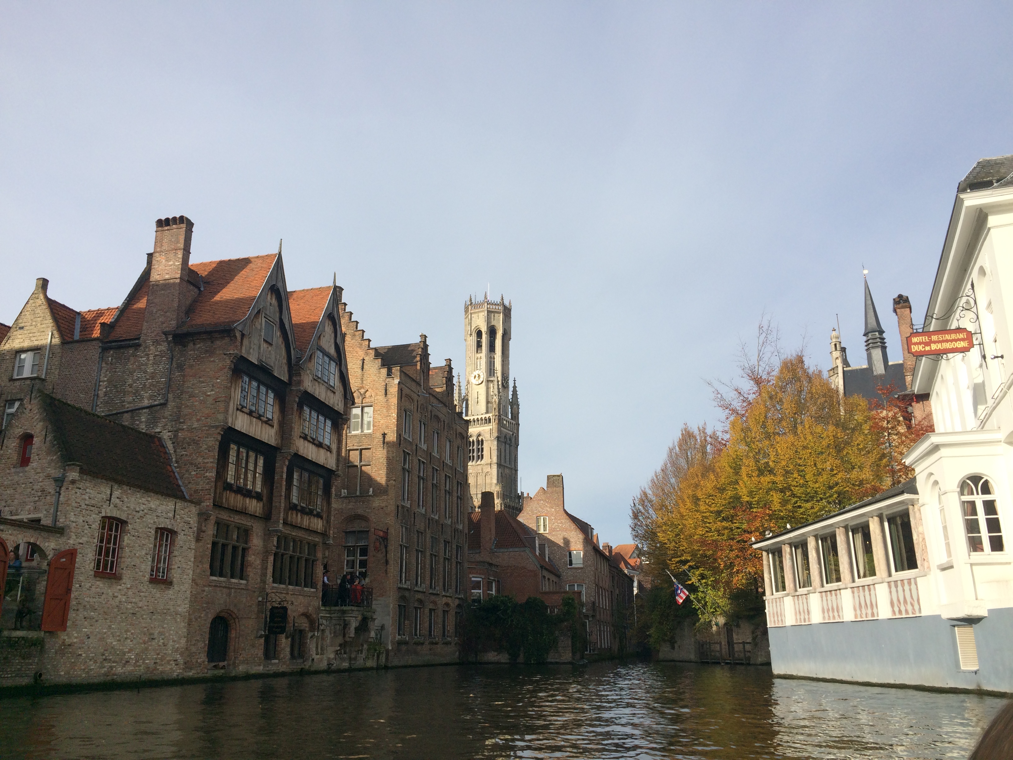 A stunning view from the Canal Boat, you can just see the Belfry in the distance, Bruges